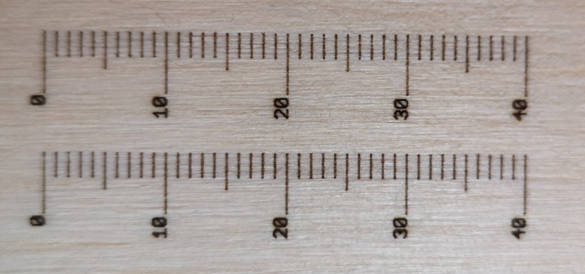 Laser engraving tests on wood with and without air assist